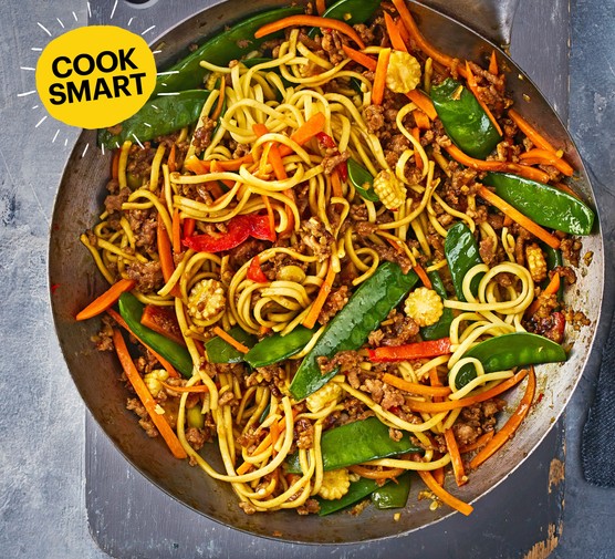 Pork stir-fry in a wok