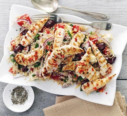 Mediterranean recipes Griddled chicken with quinoa salad on a serving platter