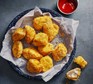 Air-fryer chicken nuggets Air-fryer chicken nuggets with ketchup alongside