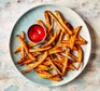 Air fryer sweet potato fries Air fryer sweet potato fries served with tomato sauce