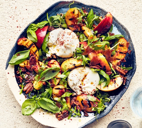 Grilled nectarine & burrata salad Grilled nectarine & burrata salad on a plate