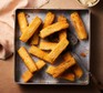 Chickpea panisse Chickpea panisse resembling chips, on a baking tray