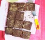 Chocolate crunch squares with knife