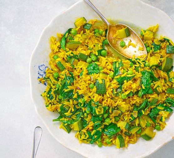 Gluten-free vegetarian recipes A bowl with curried spring veggie pilaf
