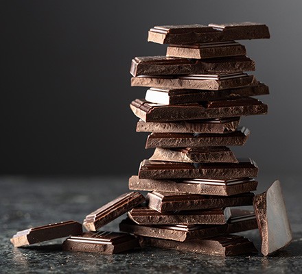 Stack of dark chocolate pieces