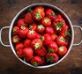 Colander full of ripe strawberries