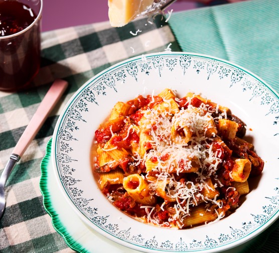A bowl of porcini mushroom, tomato & rosemary pasta
