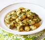 Gnocchi with herb sauce Gnocchi with herb sauce served on a white plate