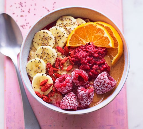 69 healthy breakfasts Bowl of porridge topped with colourful fruit