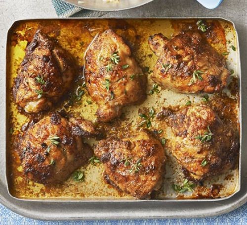 Jerk chicken recipes Jerk chicken and sauces on a roasting tray