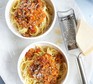 Lentil bolognese Lentil bolognese served in two bowls with parmesan