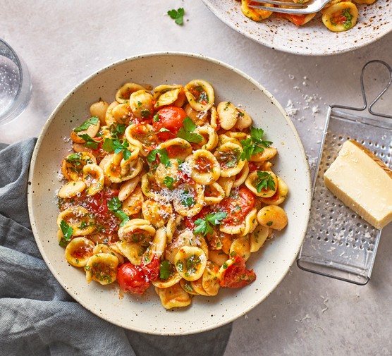 Orecchiette with butter beans parsley chilli & lemon in a bowl