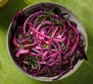 A bowl of pickled red cabbage salad