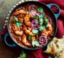 One-pot prawn & lentil curry served in a casserole dish