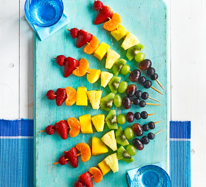 Top 20 after-school snacks for kids Rainbow fruit skewers on a platter