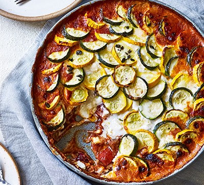 Baked ratatouille on white background