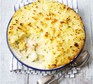 Family meals: Easy fish pie Creamy fish pie in a serving dish with a scoop out