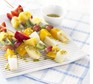 Frozen fruit sticks with passion fruit & lime drizzle Frozen fruit sticks with passion fruit & lime drizzle