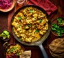 Roasted cauliflower & chickpea coconut curry in a pan