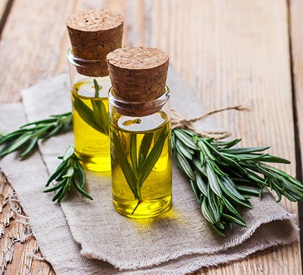 Two bottles of rosemary oil