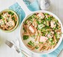 Pasta with salmon and peas A saucepan and small bowl serving pasta with salmon and peas