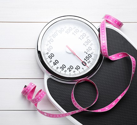 16 reasons you're not losing weight Bathroom scales and a measuring tape