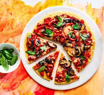 Healthy gluten-free recipes Pepper & mushroom socca pizza cut into slices