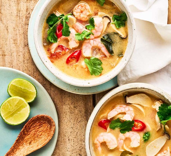 Tom yum soup with prawns Tom yum soup with prawns in two bowls
