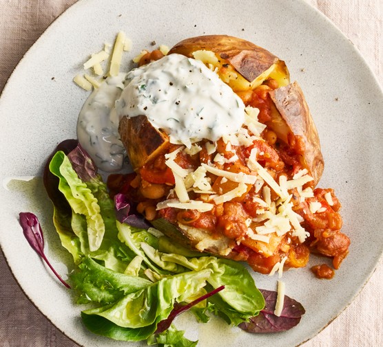 Veggie chilli in jacket potatoes